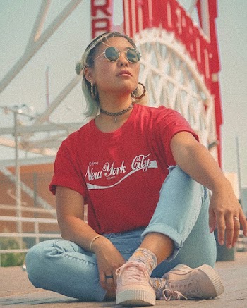 Sitting Woman Wearing Red Top