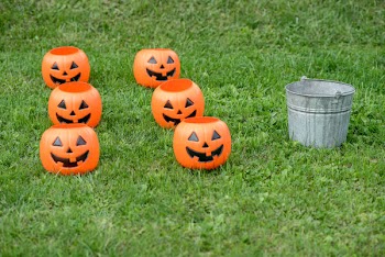 Six Jack-o-lantern Baskets On Grass Field