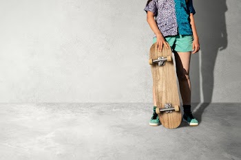 Skateboard background, teen girl skater with… | Free stock photo | High Resolution image
