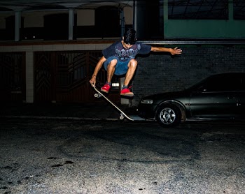 Skateboarder Doing Tricks