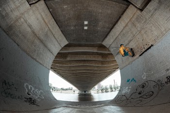 Skater in the urban skate spot under the Trojan Bridge in Prague