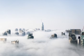 Skyscraper surrounded by clouds, free | Free Photo - rawpixel