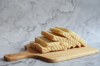 Slice Bread on Brown Chopping Board