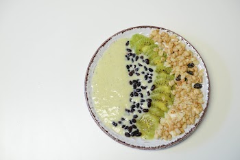 Slice Kiwifruit and Nuts on Plate