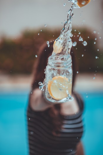Slice of Lemon Inside Mason Jar
