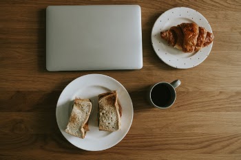 Slice of Toasted Breads in White Saucer