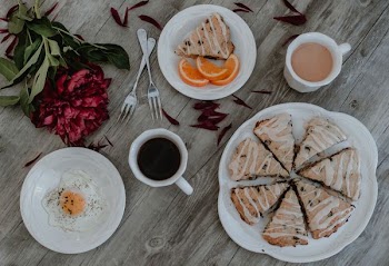 sliced cake and orange fruits