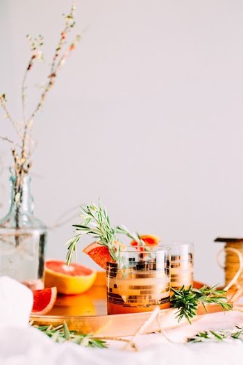sliced citrus fruit on glass