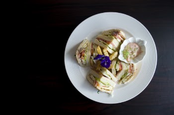Sliced Clubhouse on Round White Ceramic Plate