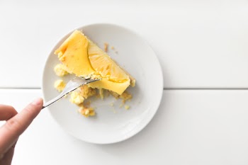 Sliced Dessert on Top of White Ceramic Plate