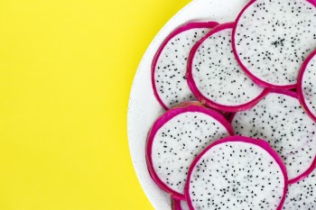 Sliced Dragon Fruit on White Plate
