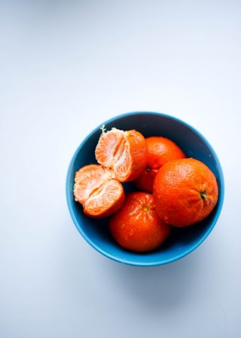 Sliced Orange Fruit on Blue Ceramic Bowl · Free Stock Photo