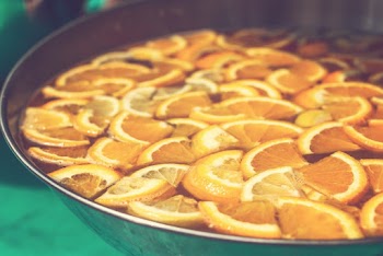 Sliced Oranges in Bowl of Water