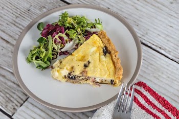 sliced pie on white ceramic plate