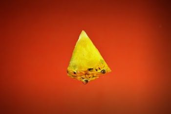 Sliced Pineapple With Orange Background