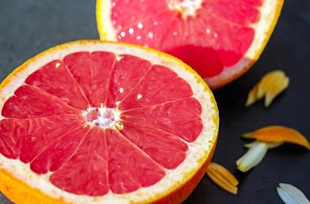          Sliced Pink Grapefruit Free Photo     