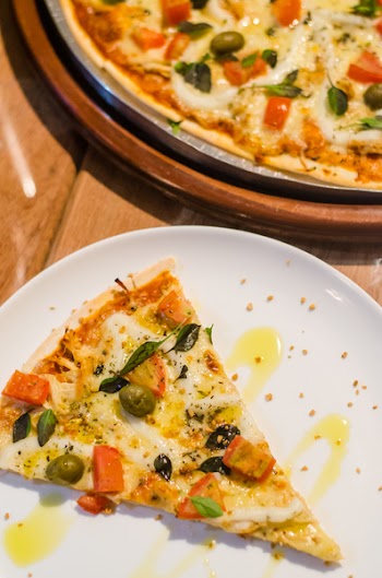 Sliced Pizza on Plate