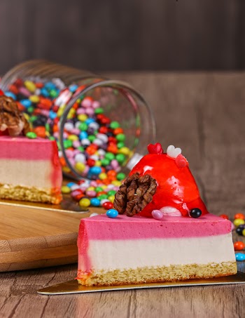 Sliced Scream Cake Near Clear Glass Mason Jar