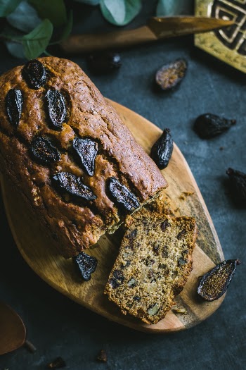 Sliced VEGAN Fig and Banana bread on a wooden board