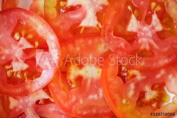Slices of freshly cut tomato