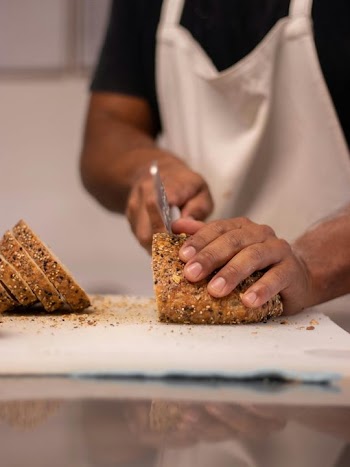 Slicing Freshly Baked Artisan Bread