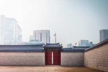 Slightly Open Red Metal Gate