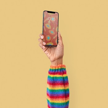 Smartphone isolated in studio with hand… | Free stock photo | High Resolution image