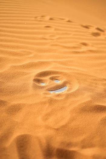 Smiley Face On Sand