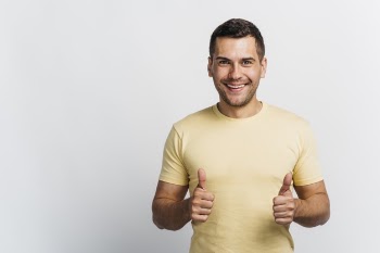 Smiley man liking an idea with copy space Free Photo