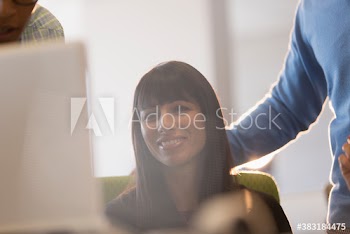 Smiling businesswoman in meeting