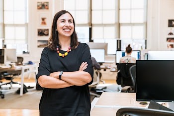 Smiling Businesswoman In Office