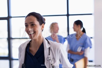 Smiling female doctor in hospital