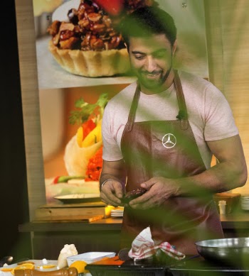 Smiling Man Holding Food