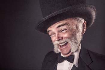 Smiling Man in Goofy Hat Free Photo 