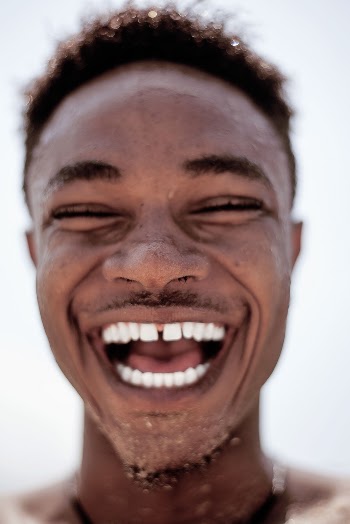 Smiling Man Taking A Selfie