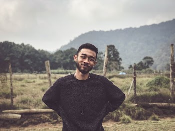 Smiling Man Wearing Black Sweatshirt