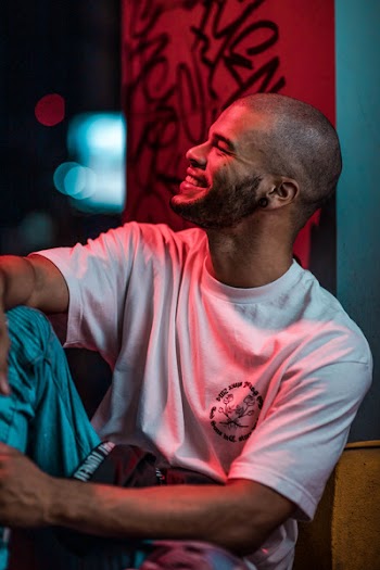 Smiling Man Wearing White Crew-neck T-shirt