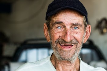 Smiling Man With Black Cap