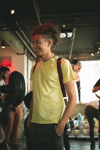Smiling Man With Both Hands In Pockets