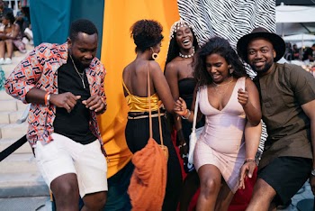 Smiling Men and Women Dancing