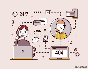 Smiling online consultant wearing headphones with microphones sitting at computer and answering customers' calls