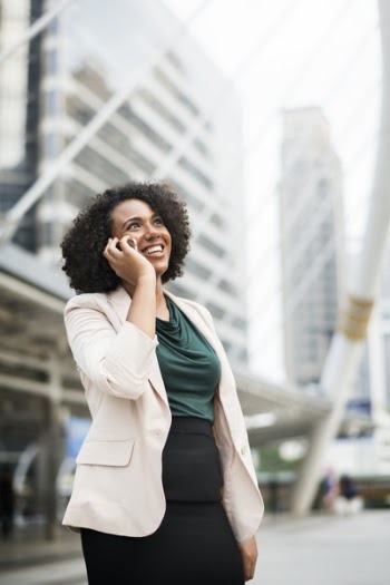 Smiling Woman Answering Phone Call
