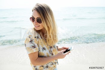 Smiling woman chill out by the sea