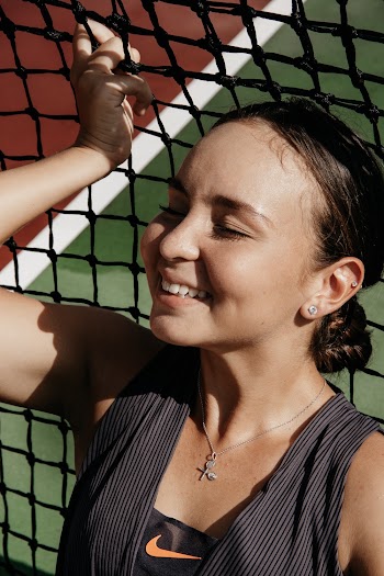 Smiling Woman Holding Net