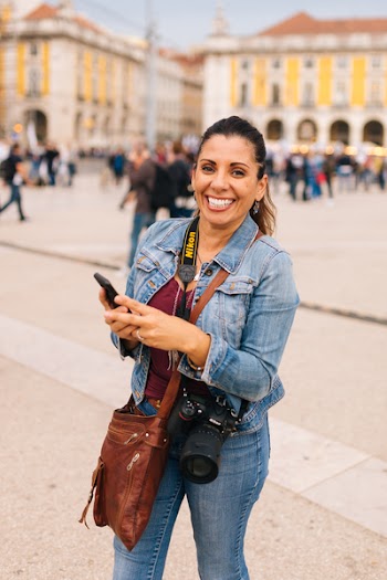 Smiling Woman Holding Smartphone Selective Focus Photography