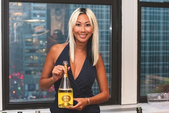 Smiling Woman Holding Wine