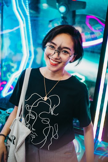 Smiling Woman in Black Scoop-neck Shirt