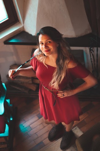 Smiling Woman in Red Dress