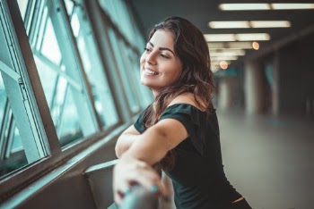 Smiling Woman Inside Building
