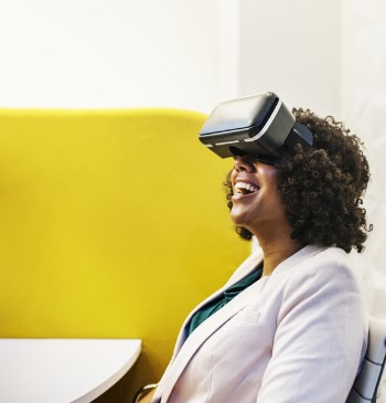 Smiling Woman Using Virtual Reality Headset